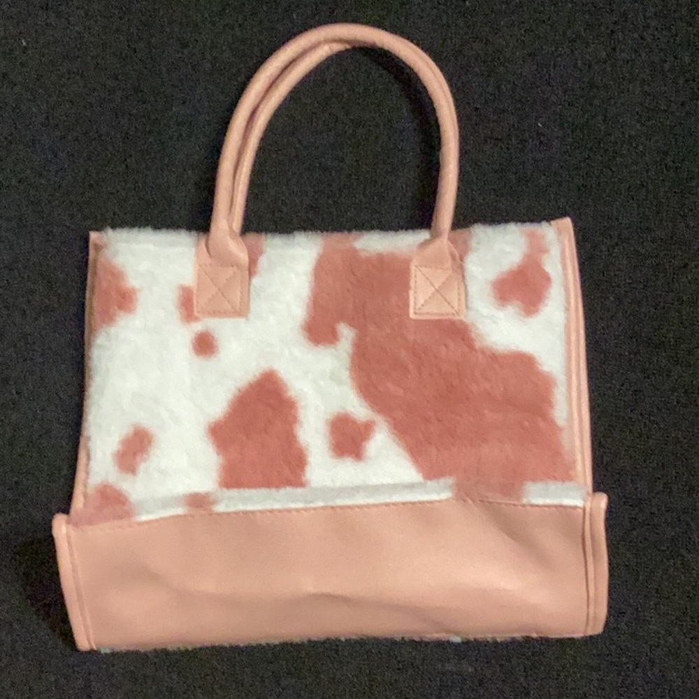 light pink and white cow print bag